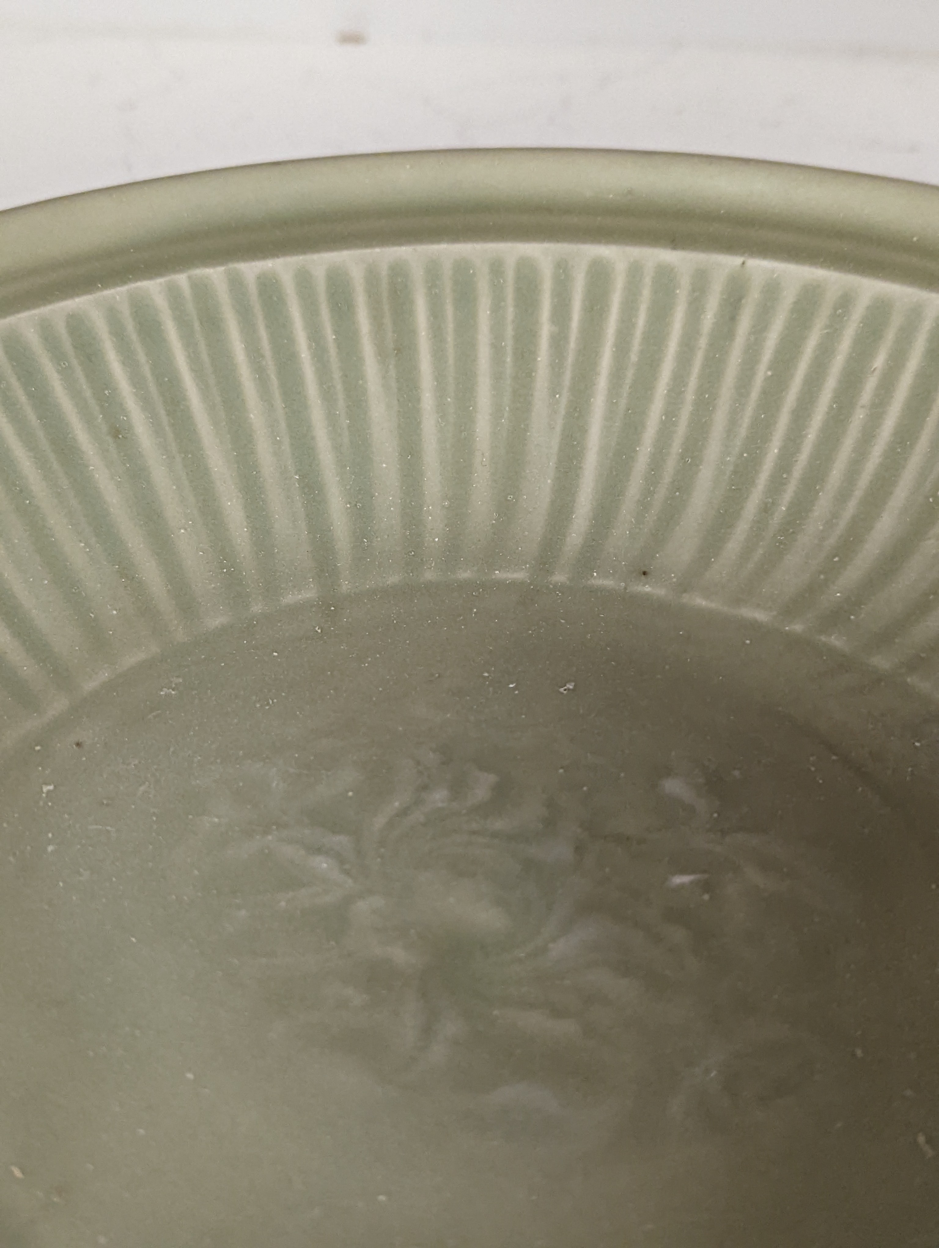 A Chinese Longquan celadon dish, 14th/15th century - 29cm wide